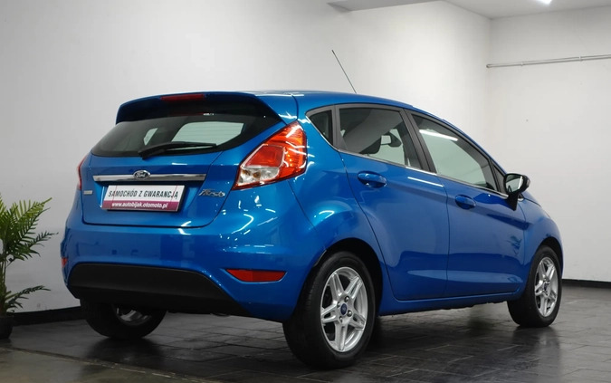 Ford Fiesta cena 26900 przebieg: 166556, rok produkcji 2013 z Wołów małe 781